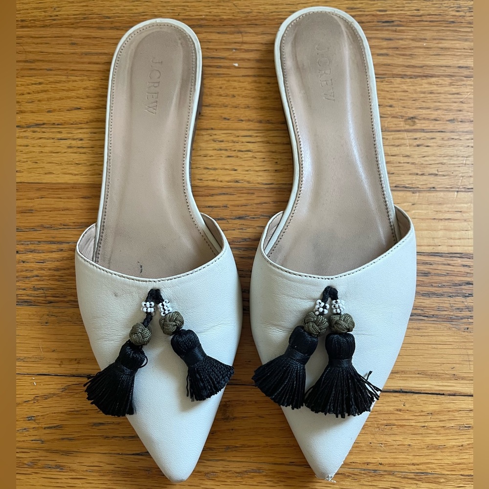 Cream J Crew mules with tassels